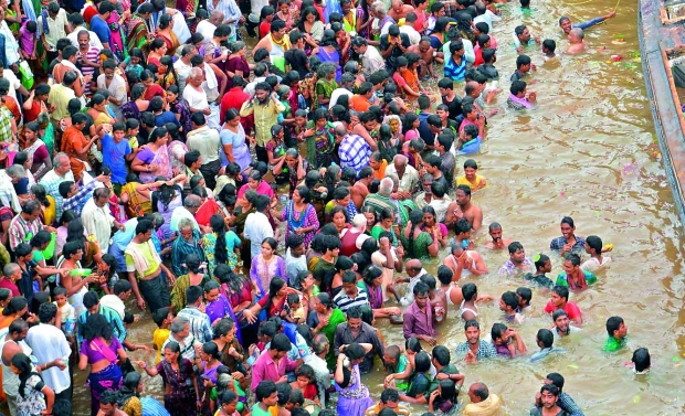 Heavy rush arrived: Devotees take a dip in the Godavari river at the Pushkar ghat as part of Maha Pushkaralu in Rajahmundry (Photo: DC) Heavy rush arrived: Devotees take a dip in the Godavari river at the Pushkar ghat as part of Maha Pushkaralu in Rajahmundry (Photo: DC)